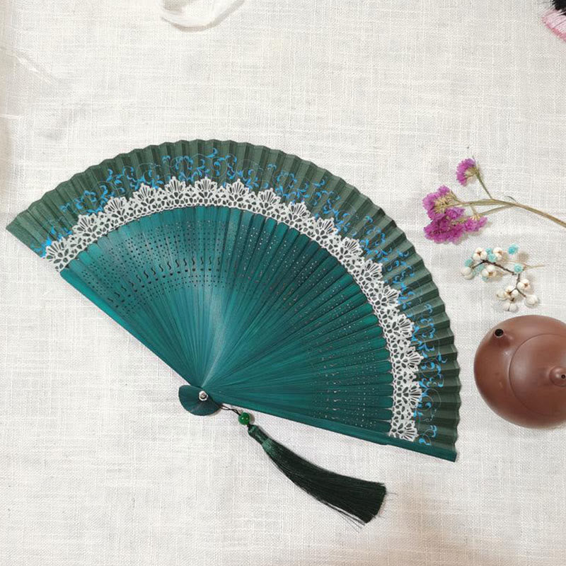 22cm Bamboo Folding Fan with Hollow Engraved Design | Tranquil Comfort