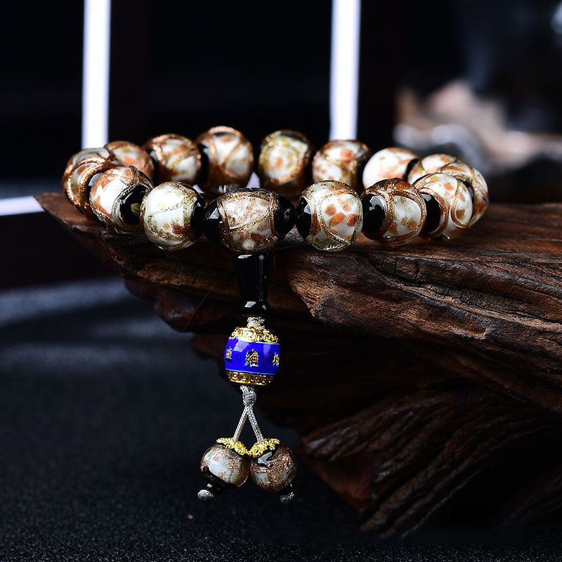 Bracelet de guérison tibétain en agate veine de dragon 14 mm