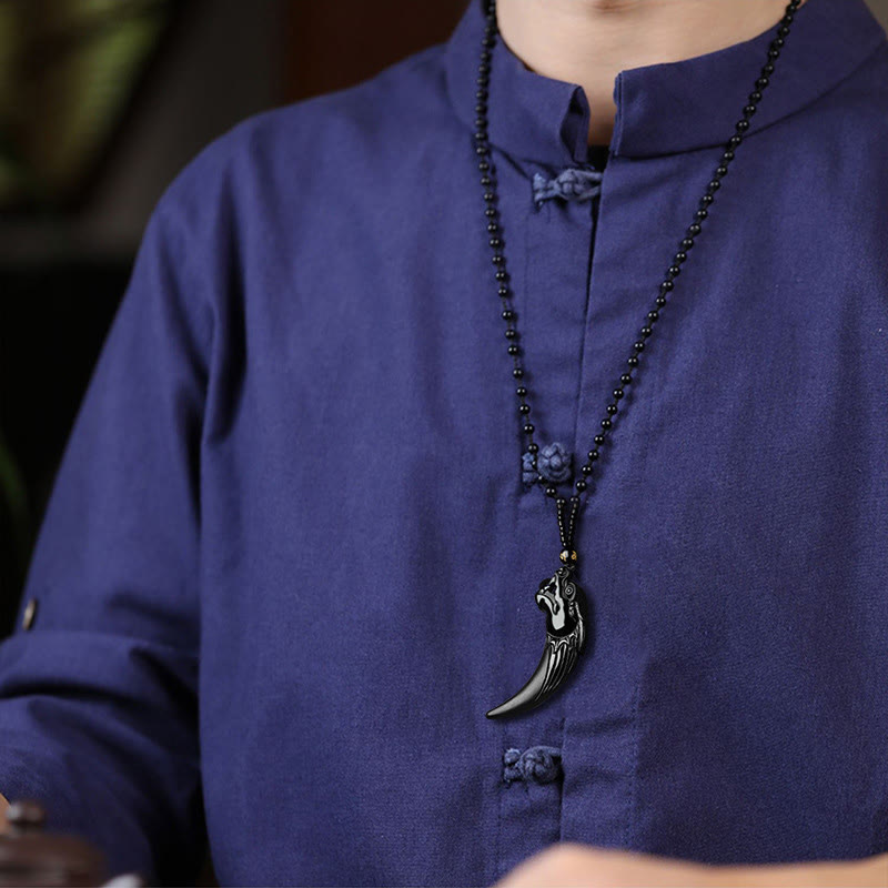 Collier dragon en jade noir pour la protection et l'énergie calme