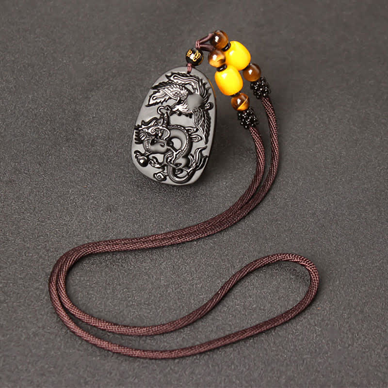 Collier dragon en obsidienne noire avec pendentif œil de tigre pour la protection