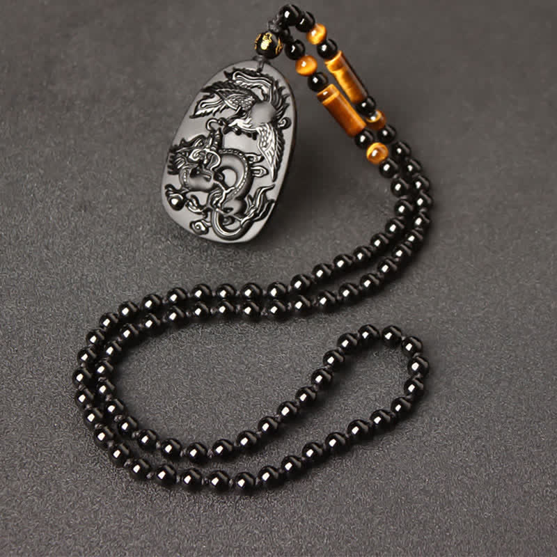 Collier dragon en obsidienne noire avec pendentif œil de tigre pour la protection