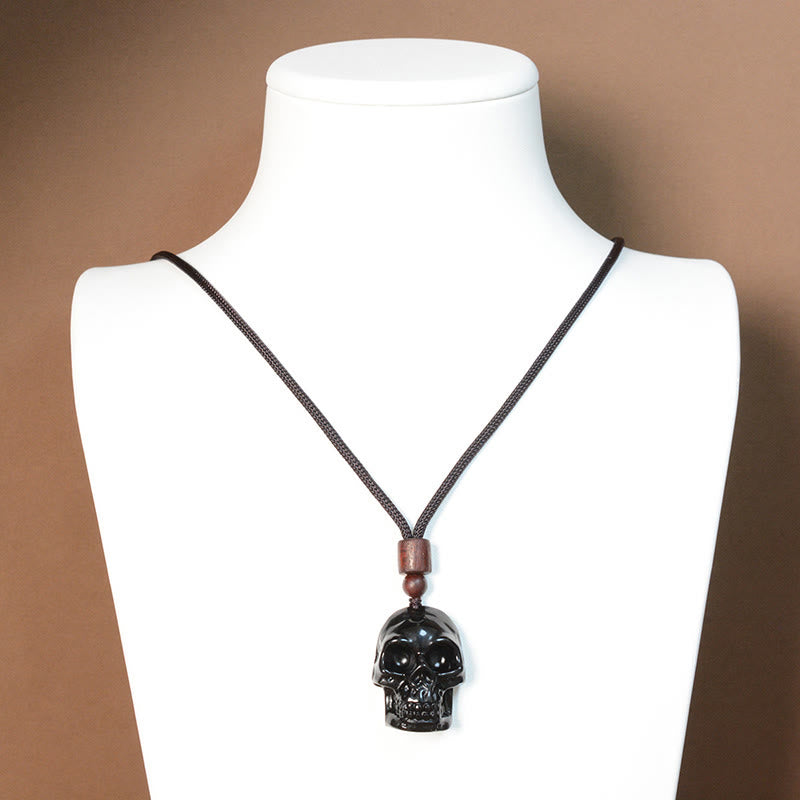 Collier squelette en obsidienne noire pour l'épanouissement et la transformation