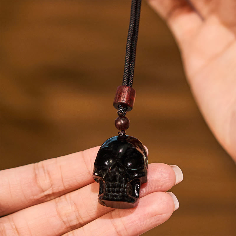 Collier squelette en obsidienne noire pour l'épanouissement et la transformation