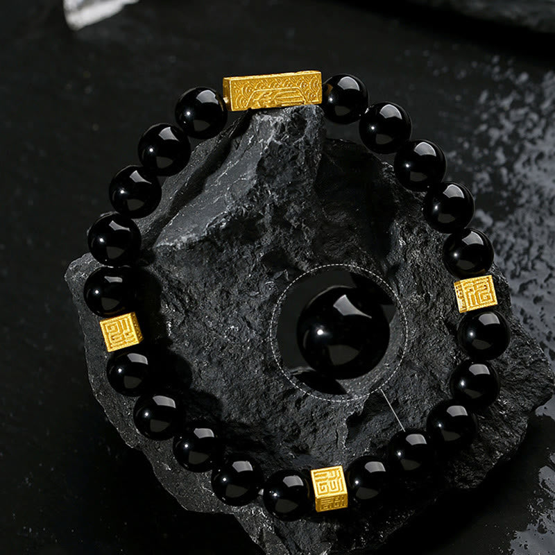 Bracelet de force en argent sterling et obsidienne noire