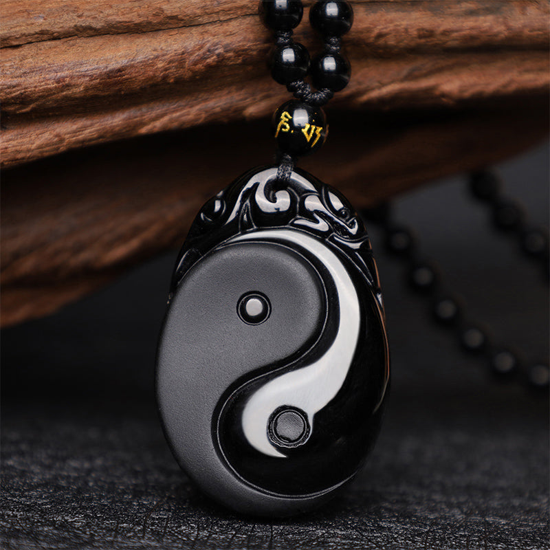 Collier pendentif Yin Yang en obsidienne noire, symbole de la force et de l'accomplissement