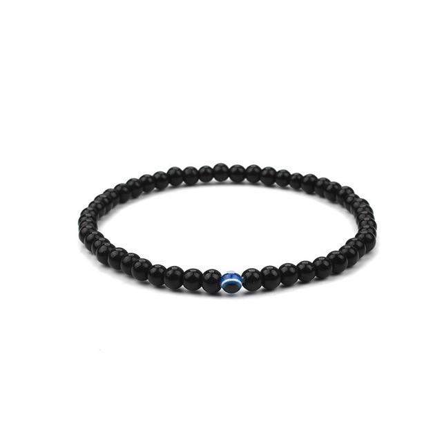 Bracelet en onyx noir avec symbole du mauvais œil