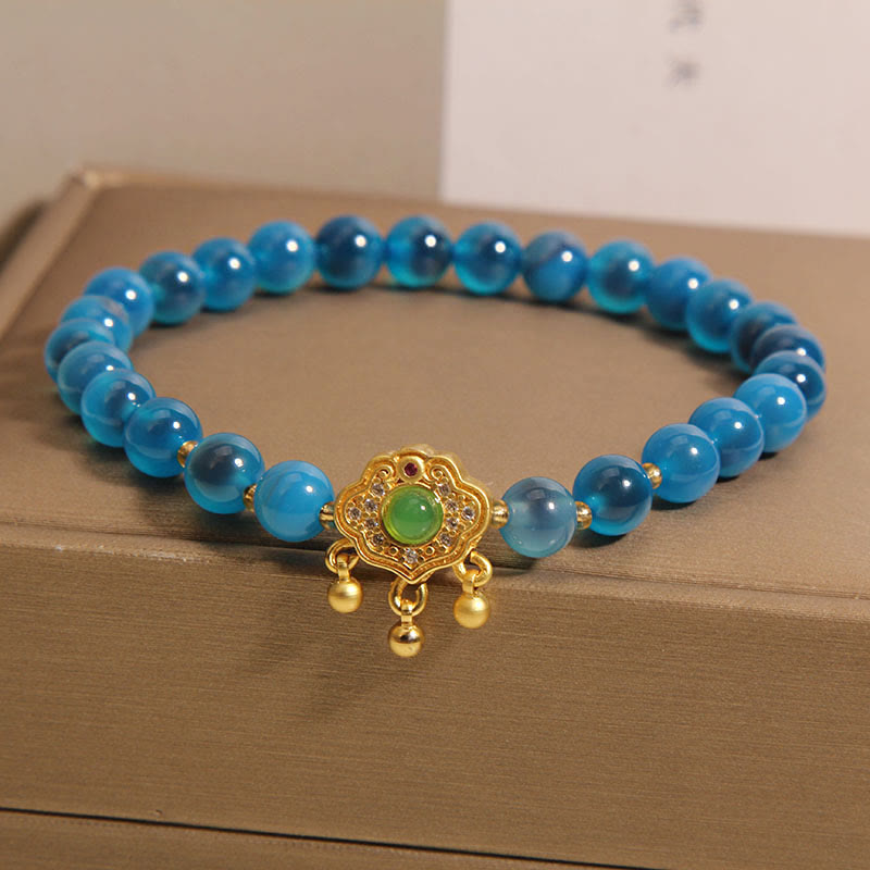 Bracelet en agate bleue avec breloque cadenas chinois pour la protection