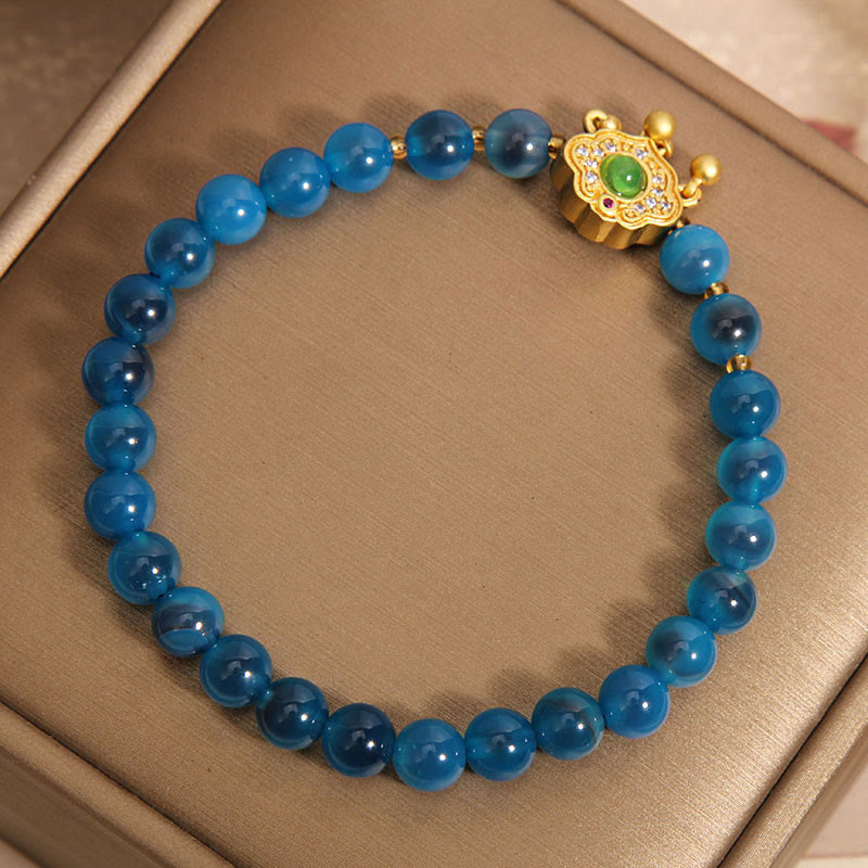 Bracelet en agate bleue avec breloque cadenas chinois pour la protection
