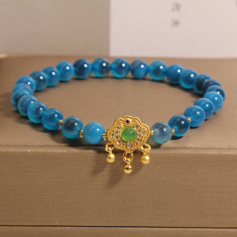 Bracelet en agate bleue avec breloque cadenas chinois pour la protection