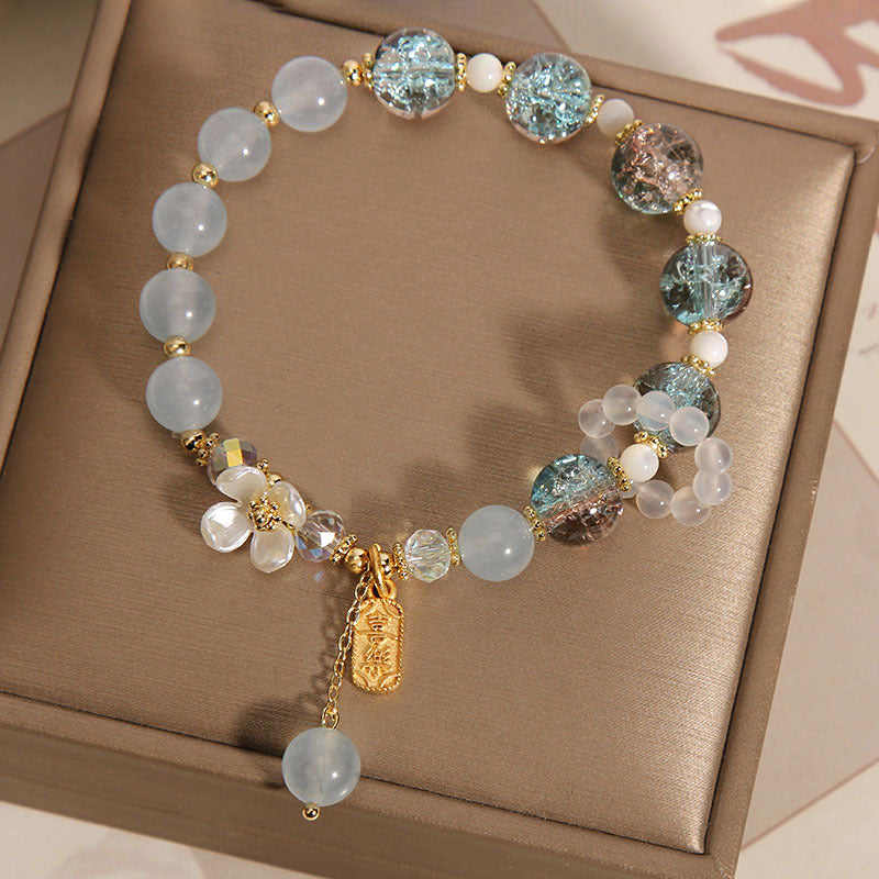 Bracelet de guérison en cristal d'améthyste bleu pour la sérénité et la clarté