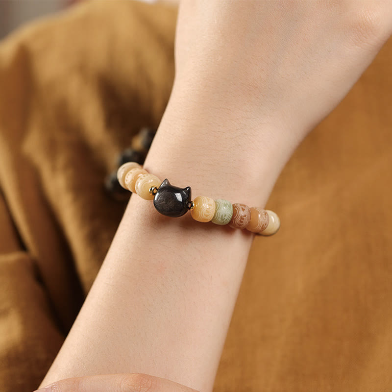 Bracelet de sagesse en graines de Bodhi et tête de chat en obsidienne