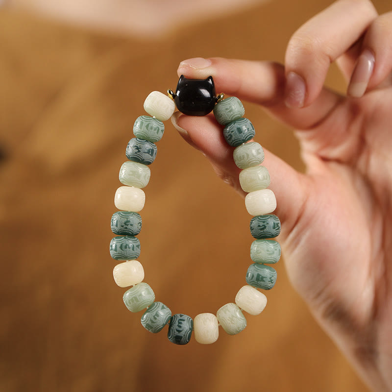 Bracelet de sagesse en graines de Bodhi et tête de chat en obsidienne