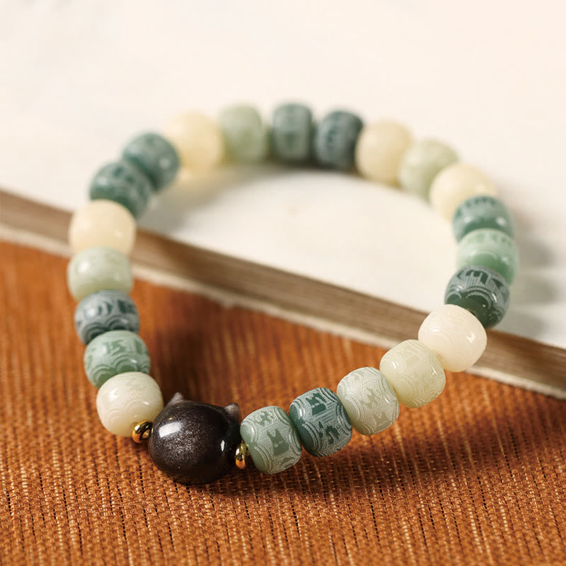 Bracelet de sagesse en graines de Bodhi et tête de chat en obsidienne
