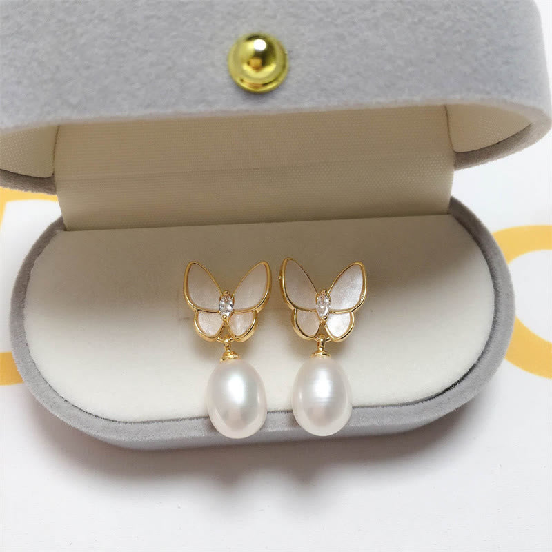 Boucles d'oreilles papillon en perles avec tiges en argent 925 pour l'optimisme