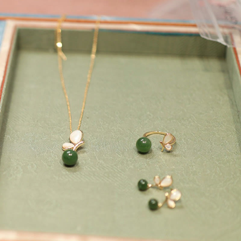 Ensemble de bijoux calmes en jade cyan et papillon tridacna