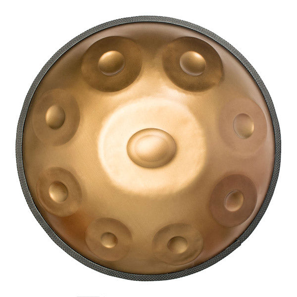 C# Amara Handpan Drum with golden-bronze surface and nine circular indentations