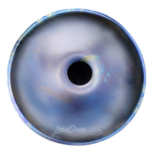 Circular C Major Handpan Drum with blue-tinted metallic surfaces and central hole
