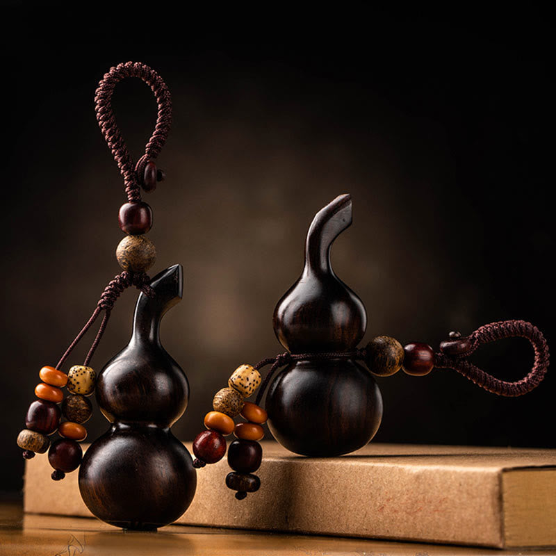 Porte-clés en ébène et gourde de santal rouge pour la chance et la protection