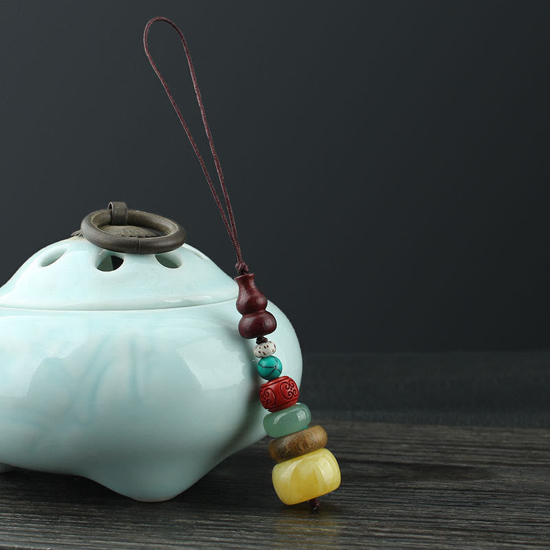 Décoration spirituelle à suspendre pour téléphone en bois de santal vert et ébène