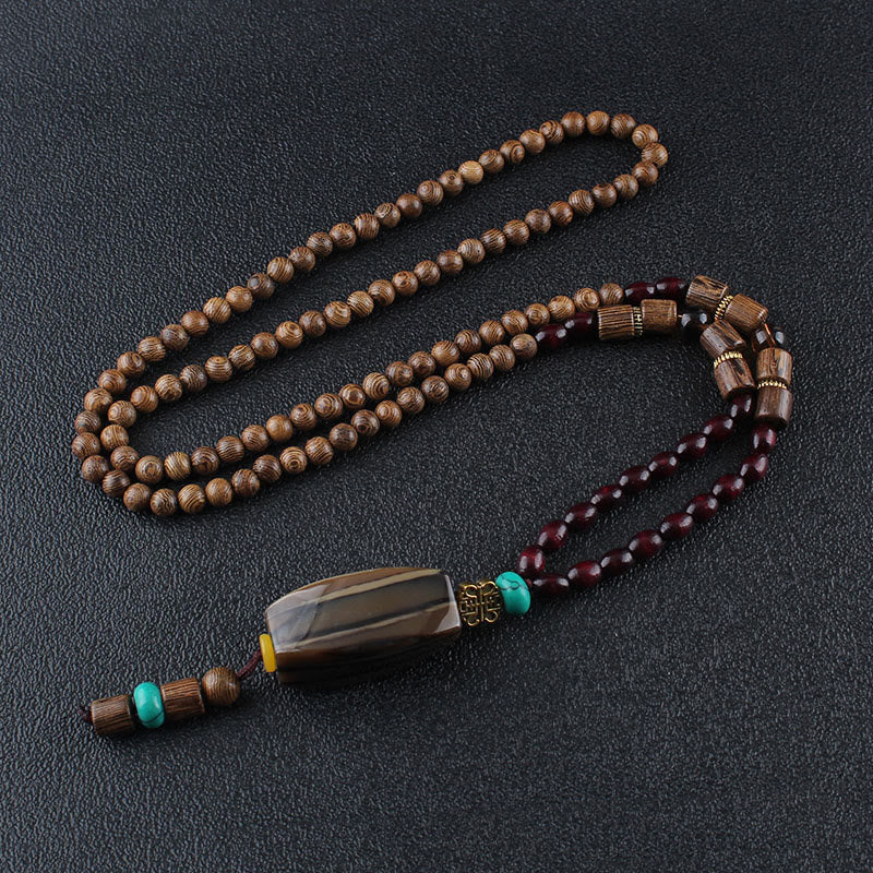 Collier d'équilibre en bois de wengé et agate pour la paix et la protection