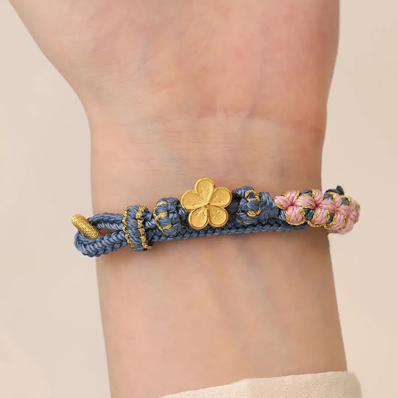 Bracelet de richesse en cuivre et fleur de pêcher pour l'équilibre