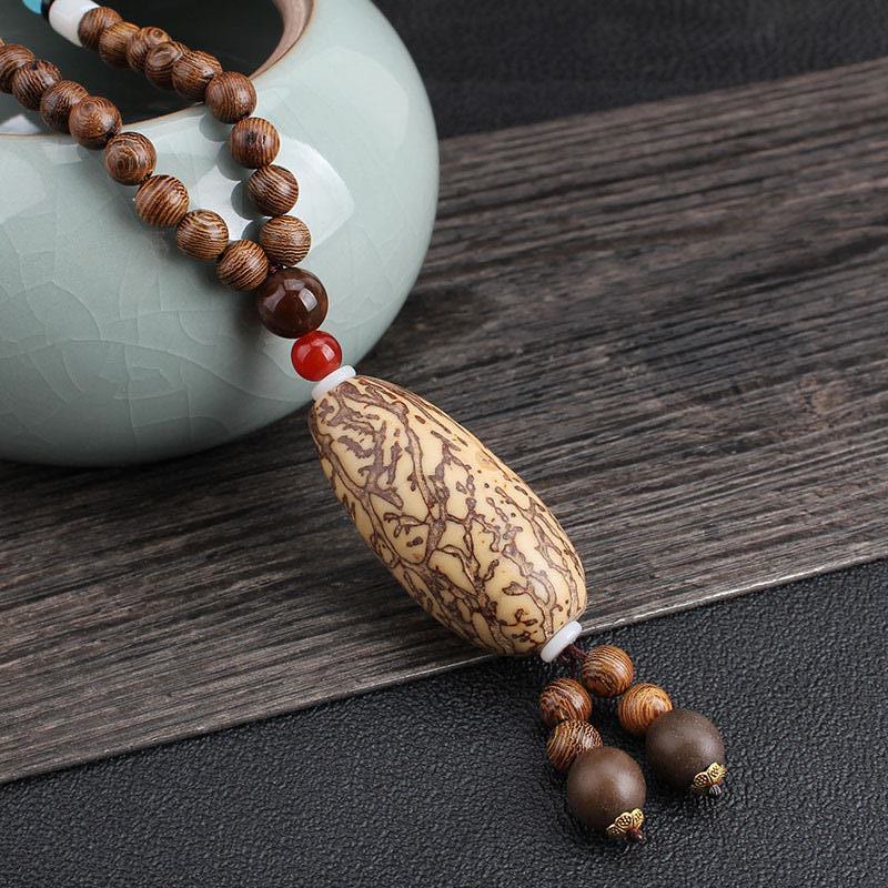 Collier d'équilibre en bois de wengé et agate pour la paix et la protection