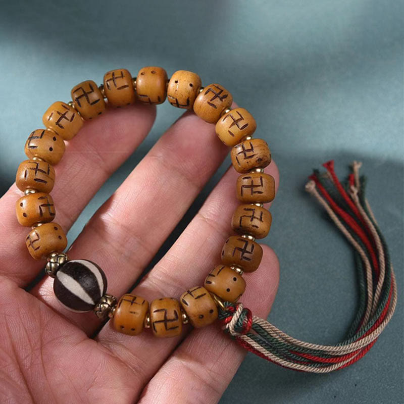 Bracelet Bouddha Dzi Swastika en os de chameau pour la chance et la protection