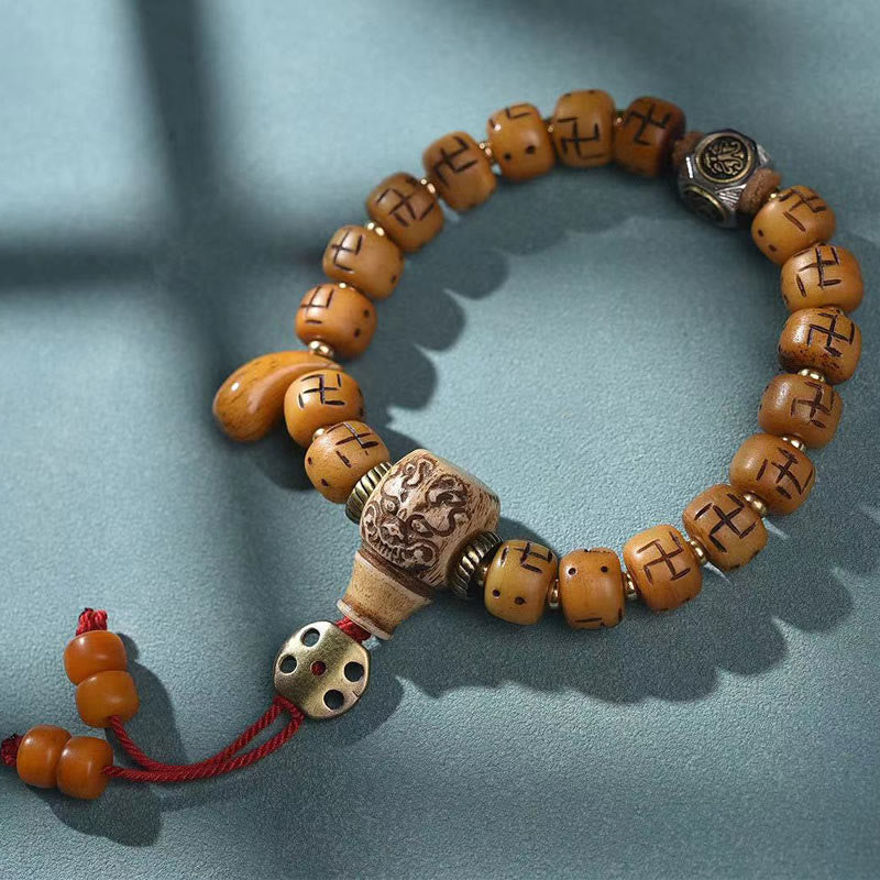 Bracelet Bouddha Dzi Swastika en os de chameau pour la chance et la protection