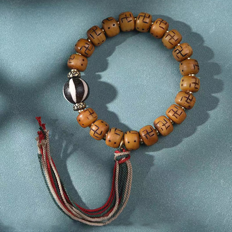 Bracelet Bouddha Dzi Swastika en os de chameau pour la chance et la protection