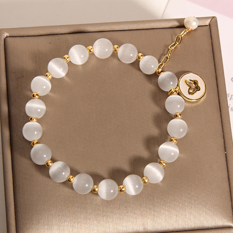 Bracelet spirituel à breloques œil de chat et papillon pour la paix et l'amour