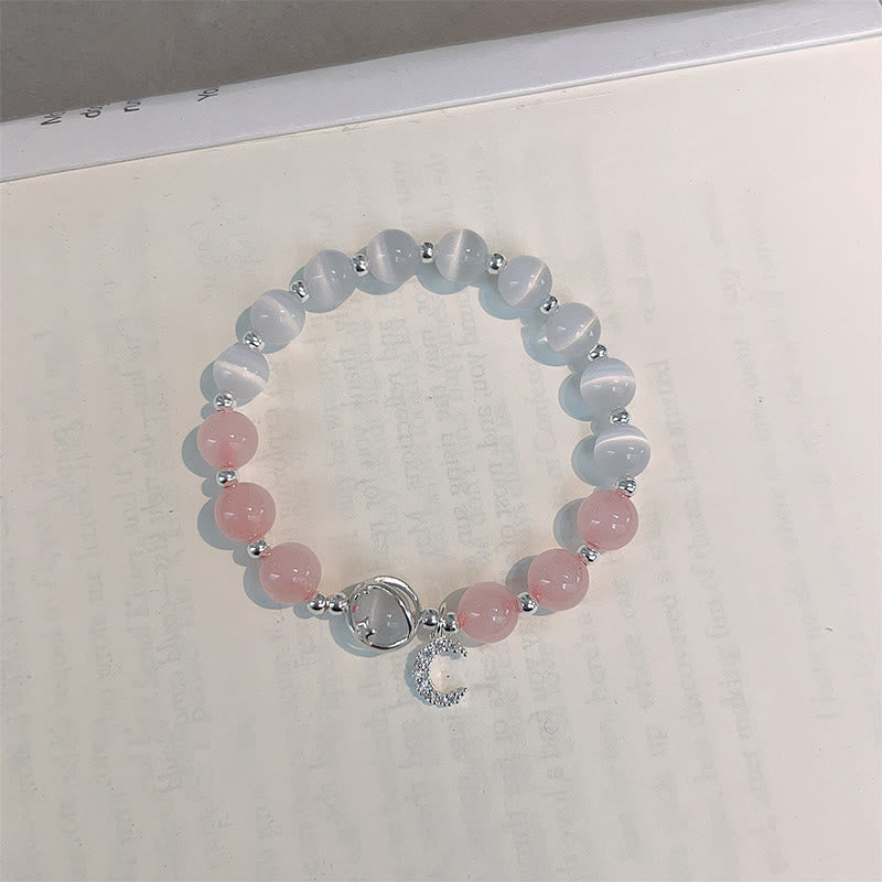 Bracelet spirituel avec breloque lune et cristal rose œil de chat