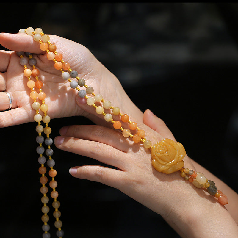 Collier pendentif en jade et soie dorée | Porte-bonheur