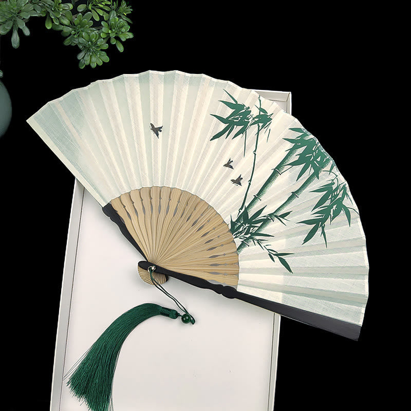 Éventail chinois pliable à motifs de bambou et de carpes koï