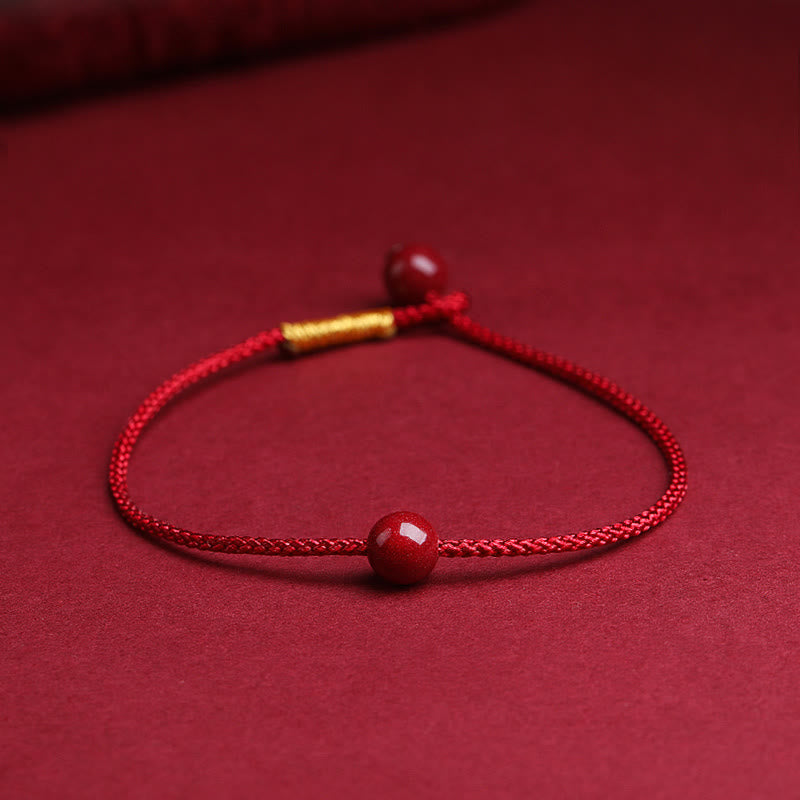Bracelet de bénédiction en fil rouge cinabre et agate rouge