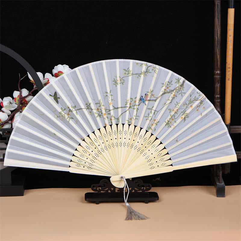Éventail pliant en bambou classique avec oiseaux et fleurs chantantes