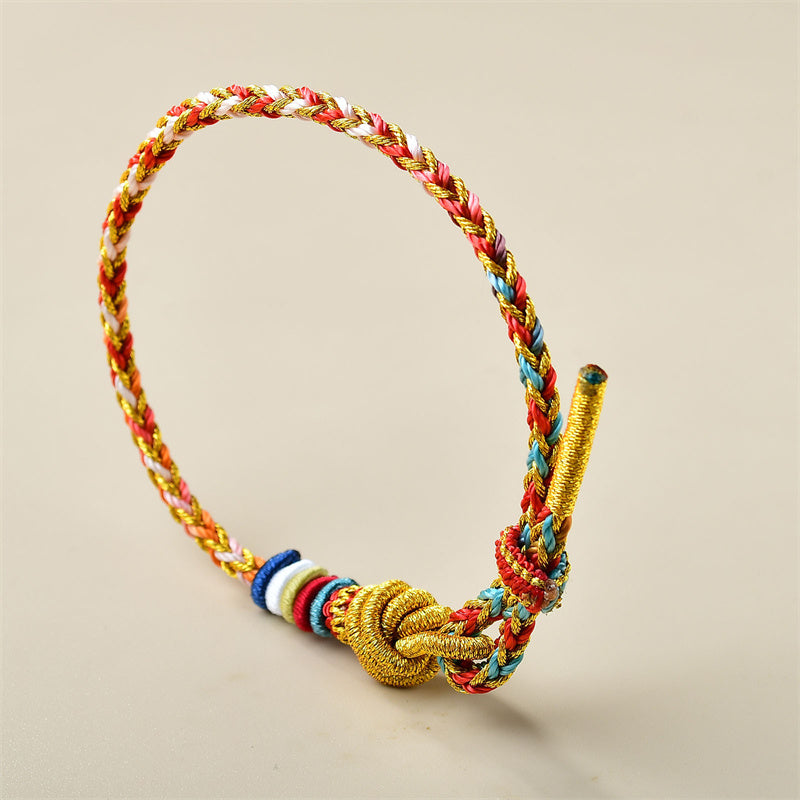Bracelet en fil rouge doré coloré pour la guérison et l'équilibre