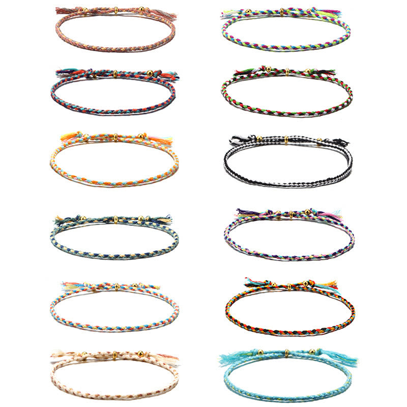 Bracelet d'harmonie coloré fait main avec pompon en corde réglable