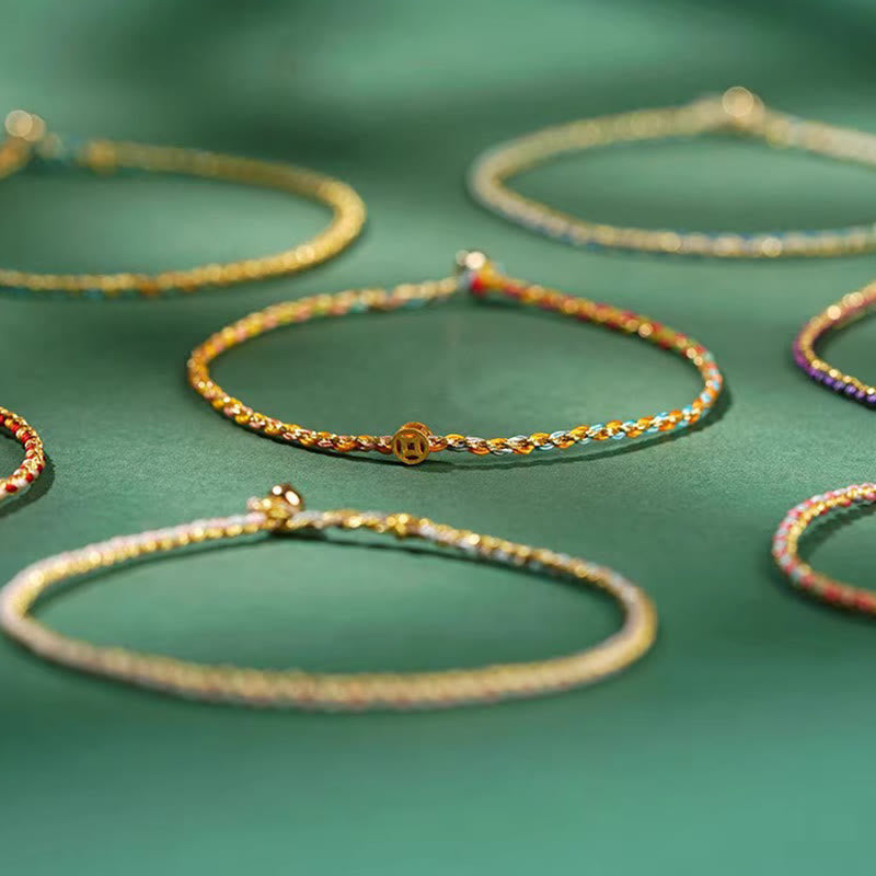 Bracelet en corde avec pièces porte-bonheur colorées 14-15 cm et sons de guérison
