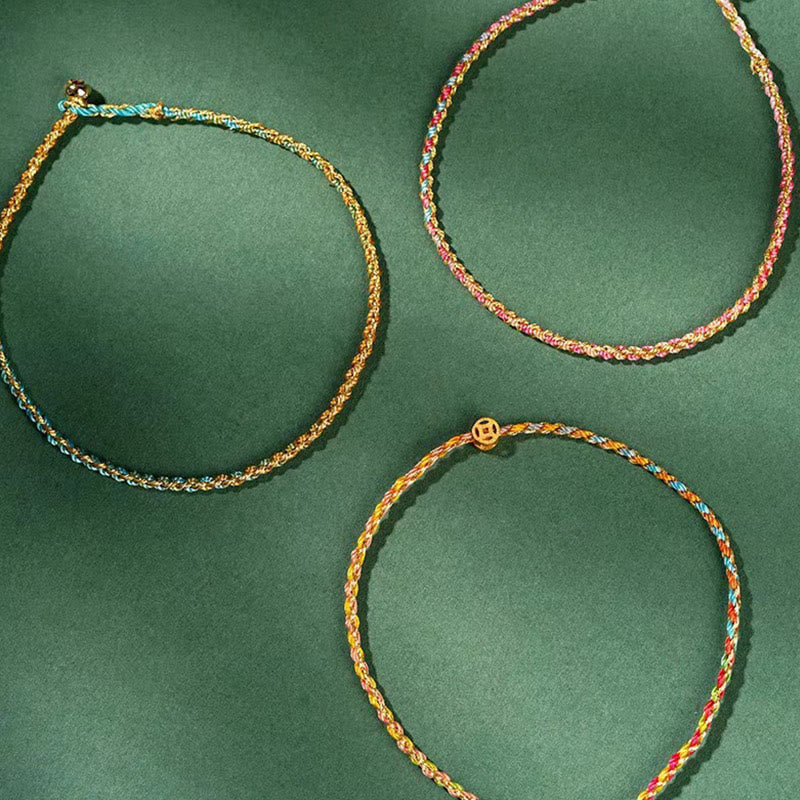 Bracelet en corde avec pièces porte-bonheur colorées 14-15 cm et sons de guérison