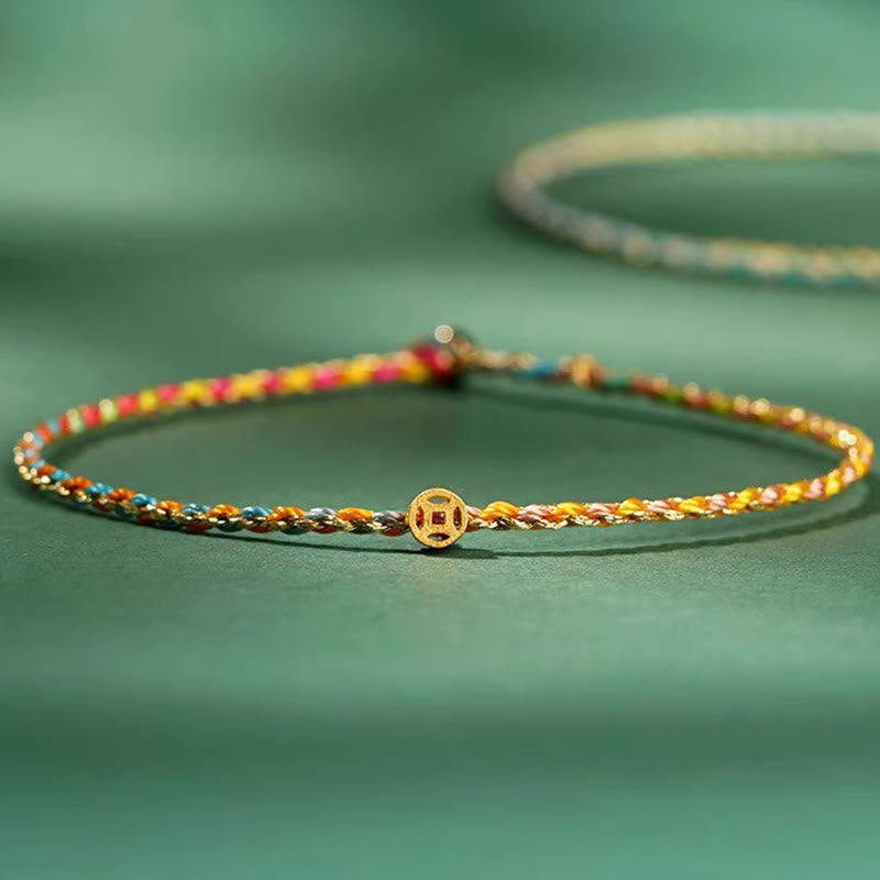 Bracelet en corde avec pièces porte-bonheur colorées 14-15 cm et sons de guérison