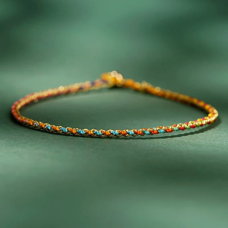 Bracelet en corde avec pièces porte-bonheur colorées 14-15 cm et sons de guérison
