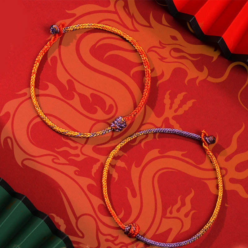 Bracelet en corde tressée colorée violette, dorée et rouge pour l'équilibre