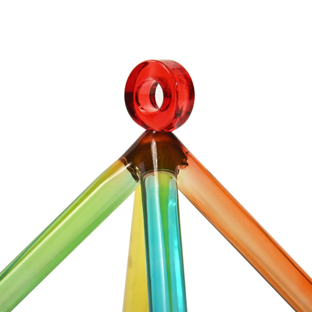 Colorful plastic drinking straws connected by a red ring in Colorful Quartz Crystal Singing Pyramid