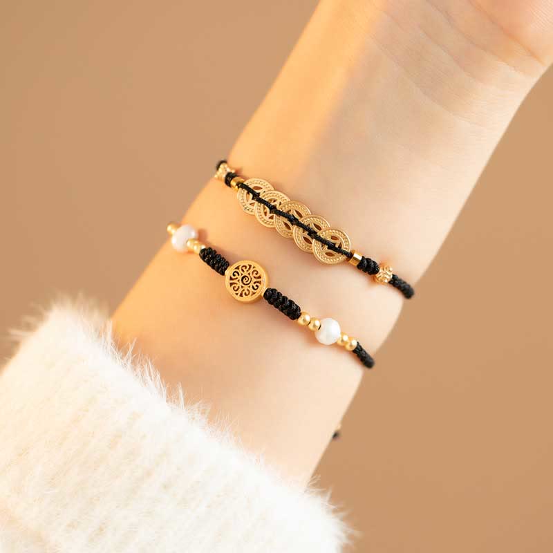 Bracelet en fil rouge avec pièce de cuivre pour la chance et la protection