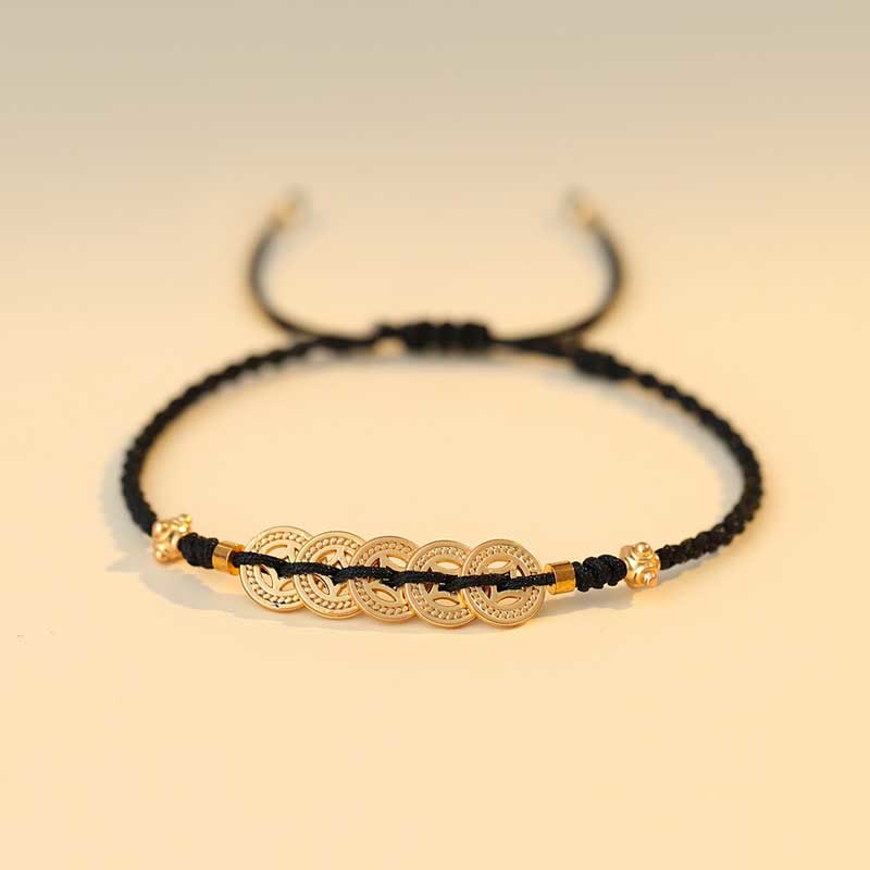 Bracelet en fil rouge avec pièce de cuivre pour la chance et la protection