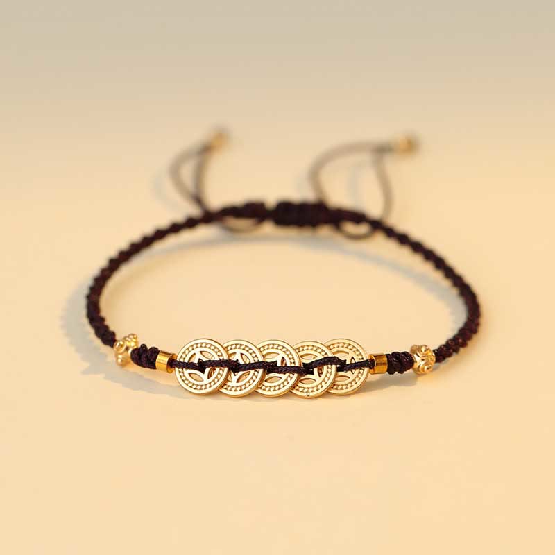 Bracelet en fil rouge avec pièce de cuivre pour la chance et la protection