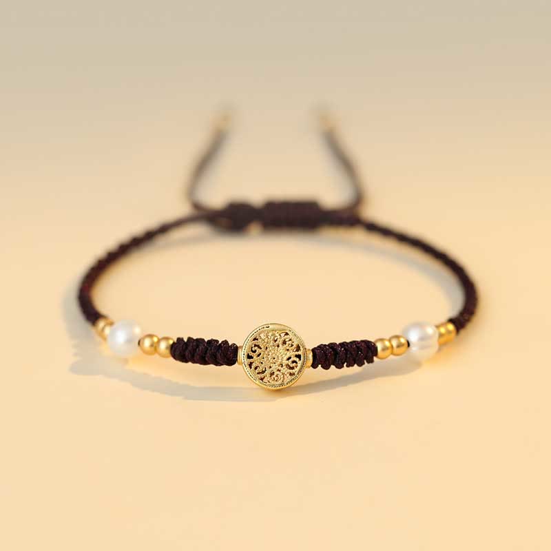 Bracelet en fil rouge avec pièce de cuivre pour la chance et la protection