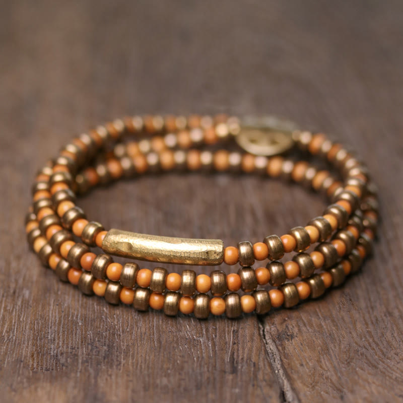 Bracelet spirituel en noyau d'olive en cuivre pour la richesse et l'équilibre