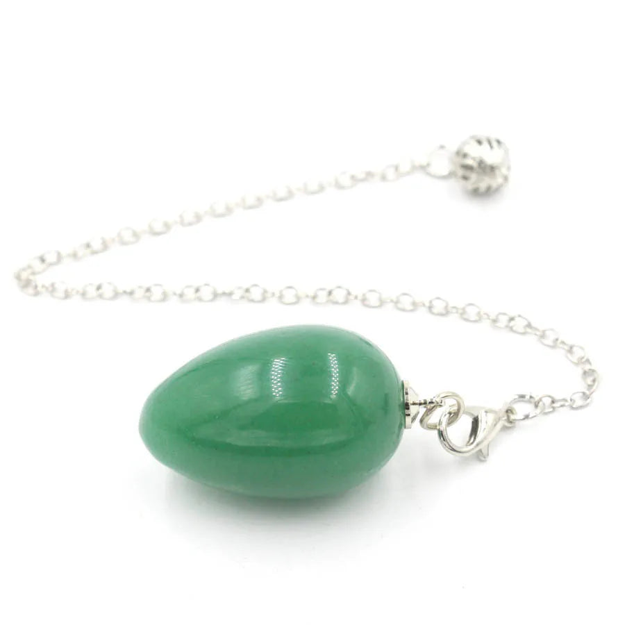 Pendule en forme d'œuf de cristal : quartz rose et plus