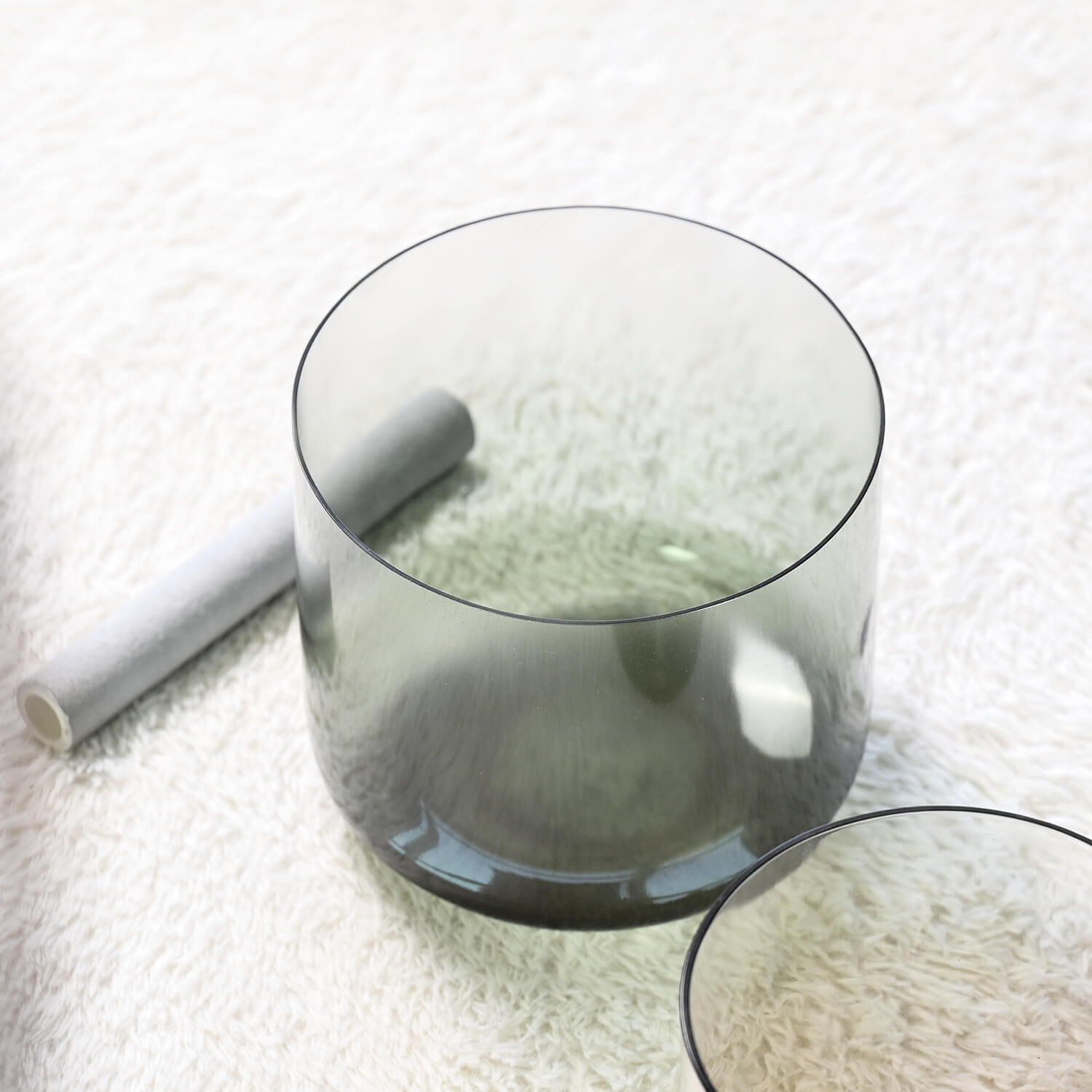 Smoky gray glass tumbler with curved sides for Crystal Quartz Singing Bowl meditation healing